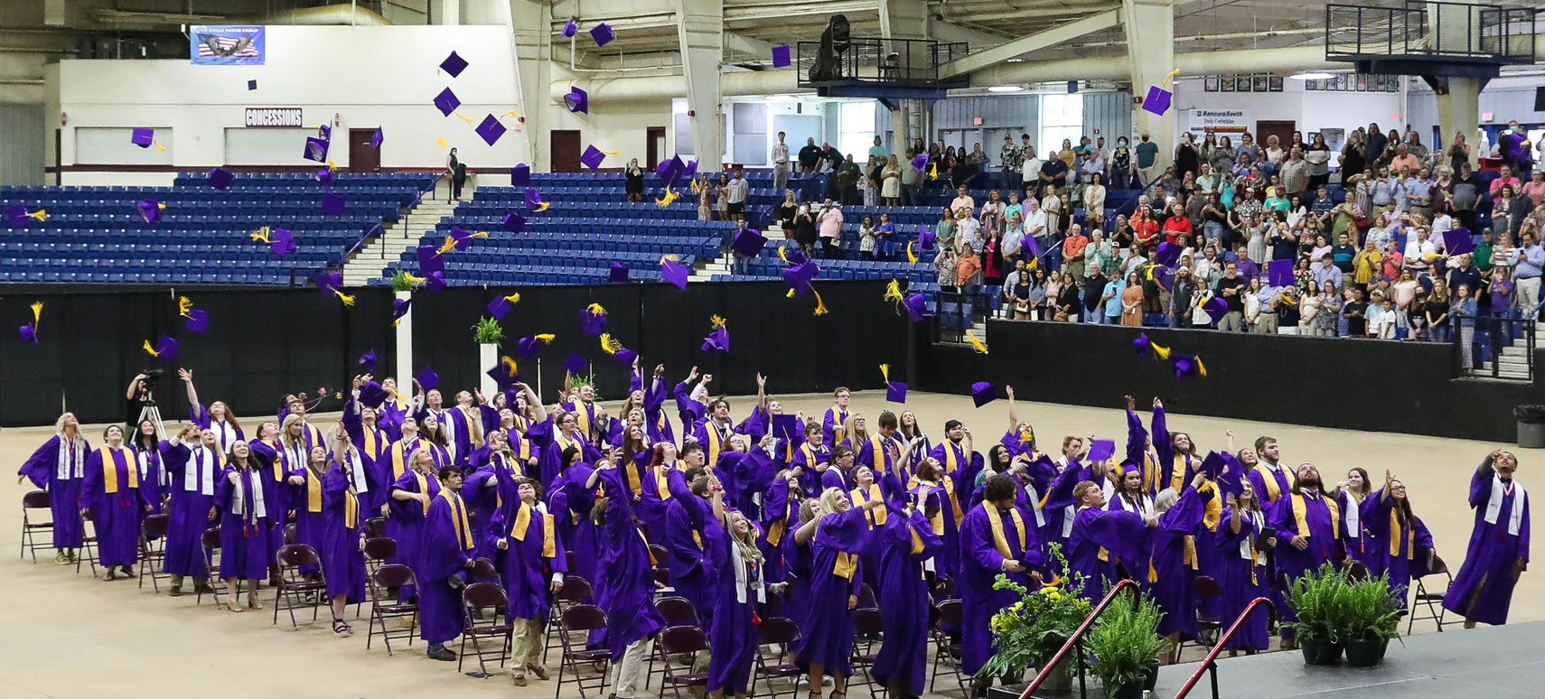 Masks off, hats off: AC graduates 95